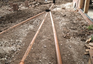 Designing drains and sewers for brownfield sites