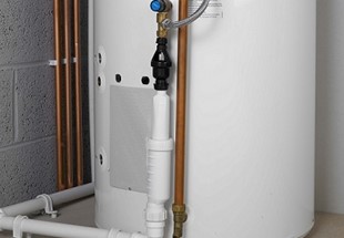 Discharge from unvented hot water storage cylinders into plastic sanitary pipework systems