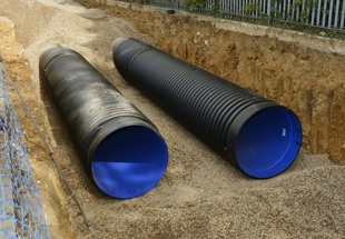 Recycled bedding and surround for gravity drains and sewers v2 